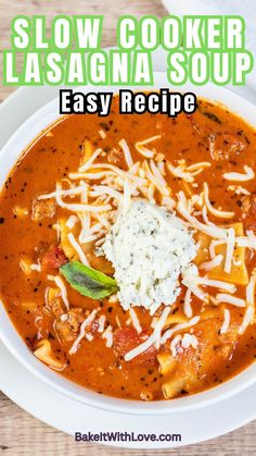 a bowl of slow cooker lasagna soup with cheese on top