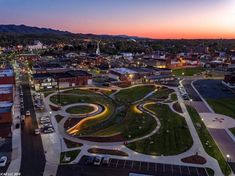 an aerial view of a city at dusk