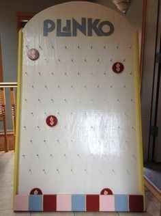 a giant pinko machine sitting on top of a tiled floor