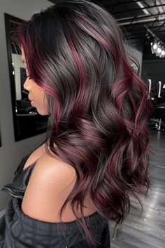 Check out our stunning collection of 45 red highlights ideas for black hair. From the subtle ruby red highlights you see here to fiery copper and ginger tones, these ideas are sure to inspire your next look. Click the pin to see them all now and follow us for more! Highlights Ideas For Black Hair, Black Hair With Red Highlights, Ideas For Black Hair, Red Hair With Highlights, Cherry Red Hair, Black Red Hair, Highlights Ideas, Black Hair Balayage, Hair Color Underneath