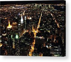 an aerial view of the city at night