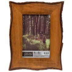 a wooden frame with an image of two people in the woods