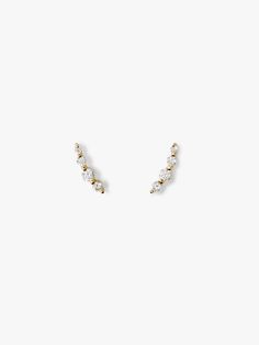 Climb your way to the top in these fabulous ear climber earrings crafted in recycled Sterling Silver and dipped in 14K gold for a luxe touch. These sparkly 14K gold-dipped earrings feature a row of four shimmering cubic zirconia gems to add a little extra shine when you catch the light. Wear these ear climber earrings alone or stacked with other earrings for a chic look.  Sparkling sterling silver earrings Finished in 14K gold & with cubic zirconia gems  Perfect to wear alone or in a chic ear st Second Tops Earrings Gold, Gold Ear Climbers, Ear Climber Earrings, Ear Climbers Earrings, White Gold Hoops, Ear Climber, Ear Stack, Climber Earrings, Ear Climbers