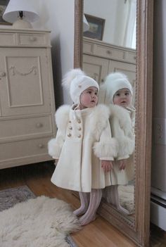 Petite Maison Kids. Ivory color genuine wool coat, fully lined. Gold button closure. Natural fur trim at shoulders and hands. Pleated back design. 100% Wool. Cape sold separately. Luxury Kids Clothes, Childrens Coats, White Coats, Designer Baby Clothes, Baby Coat, Foto Baby, Infant Clothing