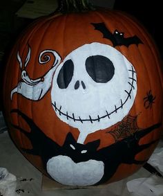 a pumpkin decorated with a jack o lantern face