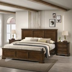 a bedroom scene with focus on the bed and nightstands