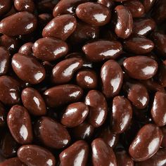 chocolate covered almonds are shown close up