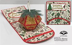 a christmas card with a potted plant on it and two other cards in the background