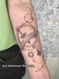 a person with a tattoo on their arm