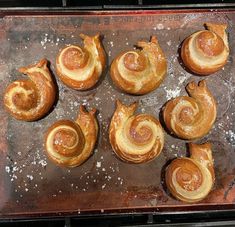 several different types of pastries on a baking sheet