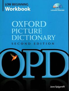 the oxford picture dictionary is shown with an image of a bird flying above it,