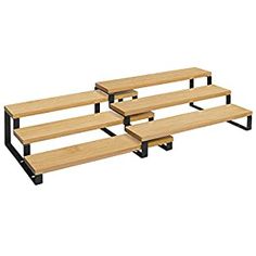 three wooden benches sitting next to each other on top of a white floor with black metal legs