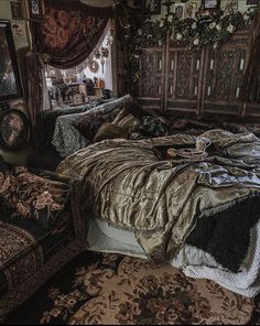 a bed sitting inside of a bedroom next to a window