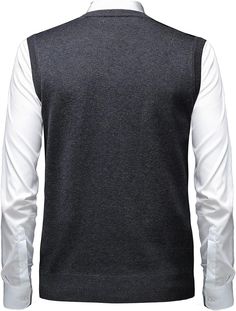 Stay warm and stylish with a Men's British Style V Neck Sleeveless Sweater Vest. Crafted with a comfortable and breathable cotton fabric, it features a classic V-neck design that adds a touch of sophistication to any outfit. Perfect for casual and dressy occasions alike. 20% Wool, 80% Acrylic & Polyester Blend Imported Button closure Machine Wash V-neck style sweater vest: to make your neck look as if longer. Argyle pattern design in colors: to match with different short and long plain or plaid Cotton V-neck Vest For Fall, Cotton V-neck Vest For Layering, Cotton V-neck Sweater Vest For Layering, Cotton V-neck Sweater Vest For Winter, Wool V-neck Sweater Vest For Winter, Gray V-neck Vest For Work, Gray Cotton Sleeveless Sweater Vest, Classic Solid Color V-neck Sweater Vest, Blue V-neck Sweater Vest For Winter