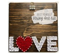 string art kit with love written on it