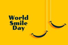 the words world smile day hanging from strings on a yellow background with black lettering that says,