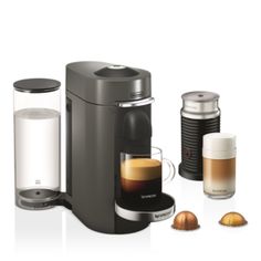 the coffee maker is next to two different types of espresso and cappuccino