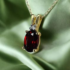 SAME DAY SHIPPING! This is a gorgeous solid 10k Yellow Gold necklace with a mesmerizing oval natural Indian Garnet with round cut diamond accent. The solid 10k yellow gold chain is approximately 20 inches long, pendant approximately 13mmx5mm. Excellent anniversary gift for wife, girlfriend, january birthstone birthday gift for daughter, etc.!  Mothers Day Gift or Valentines Day Gift! We also sell 10k, 18k, and 14k jewelry, engagement rings, wedding rings, promise rings, Valentines Day gifts, Apr Gold Jewelry Antique, Victorian Era Jewelry, Vintage Diamond Necklace, Cave Of Wonders, Jewelry Alternative, Romantic Christmas Gifts, April Birthstone Ring, Best Gift For Wife, Birthday Gift For Daughter