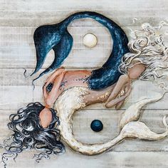 a painting of two mermaids hugging each other on wooden planks with the moon in the background