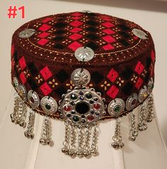 Traditional embroided cap with afghan headpiece jewelry for women/girls. Size 22 inches round, free shipping all U.S Afghan Headpiece Jewelry, Afghan Headpiece, Embroided Cap, Afghan Hat, Asian Clothing, Headpiece Jewelry, Long Hair Wedding Styles, Book Illustration Art, Afghan Dresses