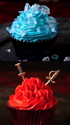 two cupcakes with blue frosting and red icing, one has an umbrella on top