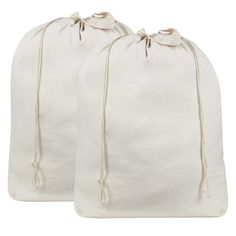 two white bags with draws on each side