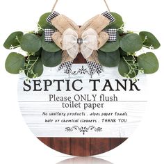 a wooden sign that says sepic tank please only flush toilet paper no soaps allowed