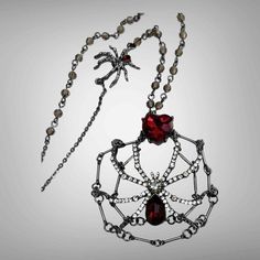 NEW Betsey Johnson SPIDERWEB NECKLACE 35" Long Beads Red Stone Heart Spider Web - NEW With Tags! Betsey Johnson In Halloween Fashion SPIDERS WEB NECKLACE features a stunning pendant embellished with deep red stones in hematite tone metal. Red crystal heart and beaded chain necklace another spider on chain and lobster clasp closure. Approx. length - 32" with 3" extender. Pendant Approx. - 2.5" Spider Web Pendant, With 2nd Spider On Chain at 1" Crystal Stone - made of glass, bezel set & dangle met Red Jewelry With Lobster Clasp For Festivals, Handmade Red Necklaces For Halloween, Adjustable Red Necklace For Halloween, Crochet Spider Web Necklace, Handmade Red Halloween Necklaces, Heart Spider Web, Spiderweb Chain, Spider Web Chain, Spiderweb Choker