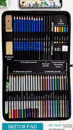 an open case filled with lots of different colored pencils