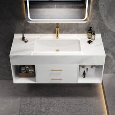 a bathroom vanity with a mirror above it and lights on the side wall behind it