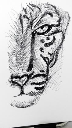 a black and white drawing of a tiger's face