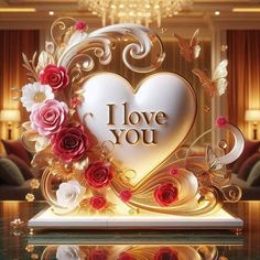 i love you sign with roses and butterflies on it in front of a mirror table