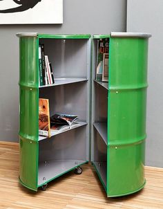 a green metal storage unit with books on it