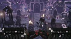 an animated halloween scene with candles and tombstones