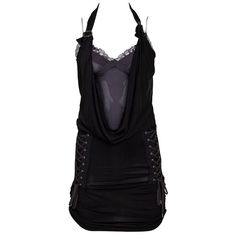 Discover The Edgy Elegance Of The Christian Dior Lace-Up Cowl Black Bodycon Halter Dress, Size Fr 36. Designed By John Galliano In 2004, This Striking Piece Features Signature Dior Star Buckle Accents, A Unique Cowl Neckline, And A Silk Slip Beneath. The Dress Showcases The Dior Logo On The Side, With Cinching Details, Spaghetti Straps, And A Halter Neckline. Recommended For U.S. Sizes Xs/S, It Measures Bust 26.75", Waist 26", Hip 23", And Length 34.75". The Dress Shows Some Wear, Including Loos Edgy Elegance, Dior Star, Dior Collection, Dior Logo, Cowl Neckline, Silk Slip, Black Bodycon Dress, John Galliano, Halter Neckline