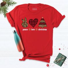 Christmas Peace Love Shirt, Holiday Shirt, Christmas Tshirt, Friends Xmas Shirt, Christmas Family Tee, Christmas Gift Shirt, Happy Xmas Tee. Hi! Welcome to our store. It's good to see you here. Our aim is to offer you first-class clothing in your most beautiful moments with our graphic t-shirts that we designed or designed with your ideas. I am sure you will like our designs for your family, friends and you. IMPORTANT MATTERS FOR ORDERING: 1-) Please check and review all photos. 2-) Our sizes are true to size, but can you take a look at my measurements in the product details section to make sure you get the best fit? The measurement is from armpit to armpit. Please let me know if you have any questions. BUSINESS DAYS: Normally postal time is 2-6 working days, rush mail is 1-4 working days, Christmas Peace, Happy Xmas, Class Outfit, Xmas Tees, Christmas Tshirt, Good To See You, Family Tees, Xmas Shirts, Holiday Shirt