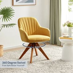 a yellow chair sitting in front of a window next to a potted palm tree