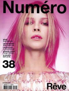 a woman with pink hair is featured on the cover of numero's magazine