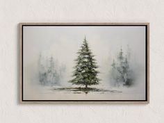 a watercolor painting of a pine tree on a white wall with a wooden frame