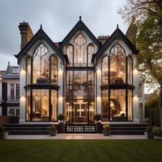 Floor to ceiling windows on a gorgeous black and white Gothic house. Gothic Colonial House, Modern Victorian Homes Floor Plans, Window House Design, Gothic House Design, Castle Style House, Victorian Gothic House Exterior, Black Victorian House, Gothic Style House, Gothic Architecture House