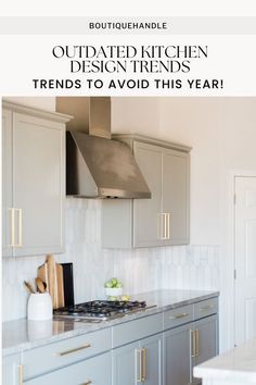 a kitchen with gray cabinets and white marble counter tops is featured in the article, outdated kitchen design trend