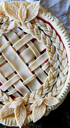 a pie sitting on top of a white plate