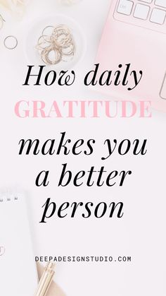 a desk with a laptop, notepad and pen on it that says hoo daily gratitude makes you a better person