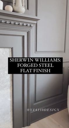 a fireplace with the words sherwin williams forged steel flat finish on it