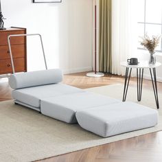 a living room with a large white couch