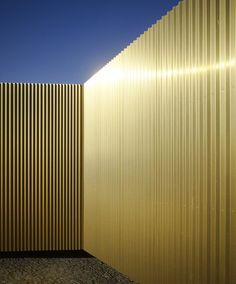 an image of a building that looks like it is made out of gold corrugated foil