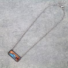 Accessorize in the wild, wild west with this super stylish multi-colored stone bar necklace! Ideal for wherever your life takes you - from the ranch to the town square - this is the go-to necklace that adds a touch of western-style glamour to your look. Yeehaw!