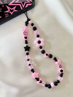 Bead Strap Phone, Phone Charm Ideas Pink, Black Phone Strap, Gantungan Hp Manik-manik, Bead Phone Charms, Phone Charms Strap, Pink Phone Charm, Phone Strap Beads, Beaded Phone Charms