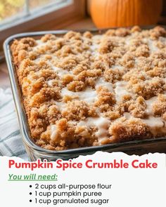 a pumpkin spice crumble cake in a pan