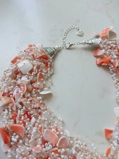 Natural shells necklace, Orange seashell necklace, Mermaid style jewelry, Tropical beach wedding bridal necklace, Crocheted necklace for her. Crocheted natural shells beach party style necklace with your choose of shell chips and glass seed beads. A light, beautiful and flexible piece of jewelry, it will be a great addition to an evening or a wedding gown. It might be a perfect gift for her for a birthday, anniversary or another occasion. Measure: length (flexible): 48 cm (19 inches) + 4 cm chai Beach Wedding Necklace, Shells Necklace, Tropical Beach Wedding, 30th Birthday Gift, Necklace Orange, Necklace For Her, Mermaid Style, Seashell Necklace, Tassel Jewelry